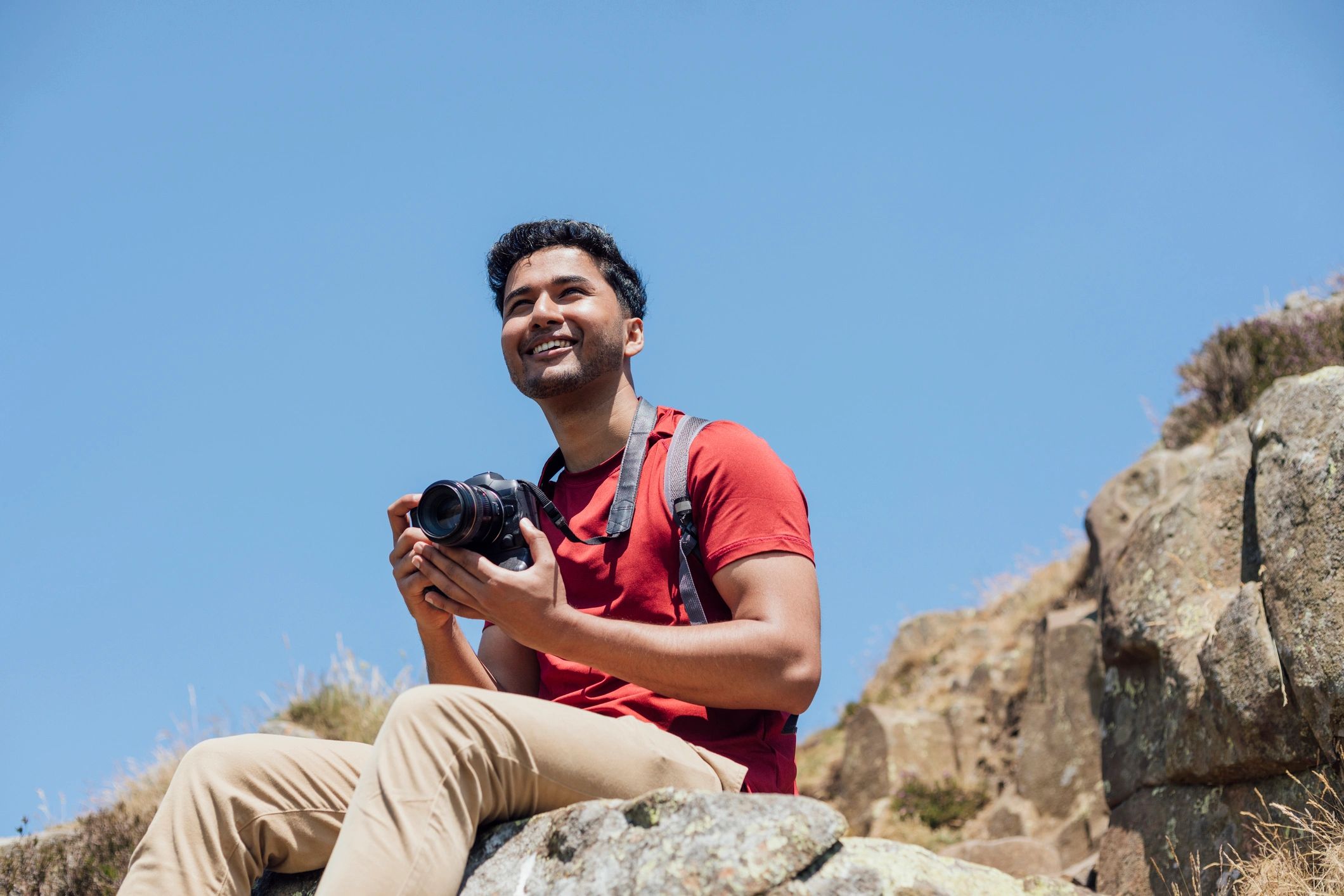 Photographer preparing for a portrait session outdoors