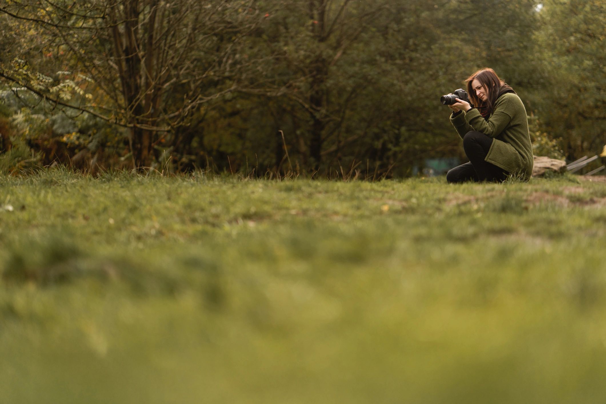 Portrait photographer during an outdoor session