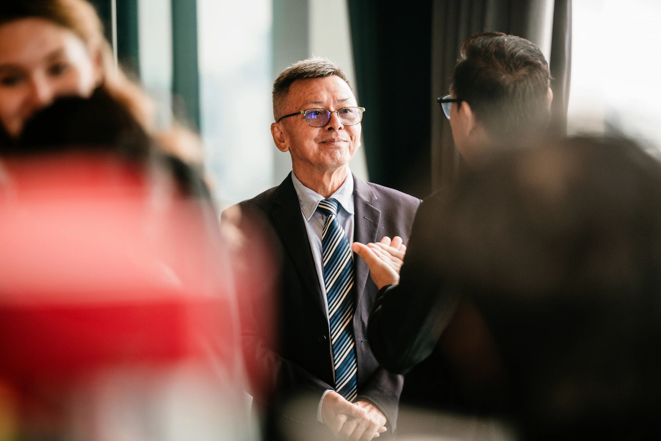 Professional attendee at an indoor conference